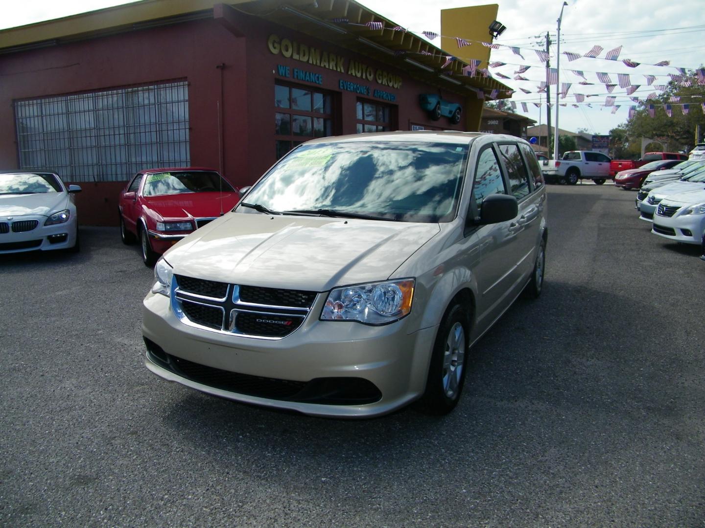 2013 GOLD /Black Dodge Grand Caravan SE (2C4RDGBG3DR) with an 3.6L V6 DOHC 24V engine, Automatic transmission, located at 4000 Bee Ridge Road, Sarasota, FL, 34233, (941) 926-0300, 27.298664, -82.489151 - Photo#0